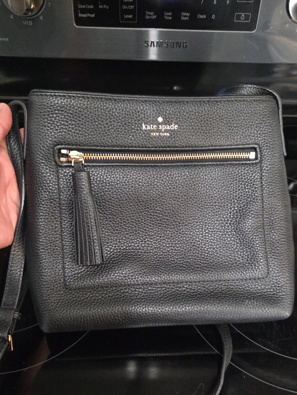 kate spade Black Pebbled Leather Crossbody with Tassel Zip